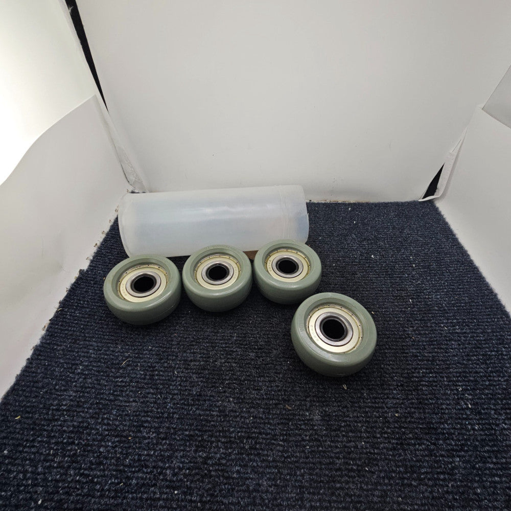 (QTY 4) Interroll 1027007 Rubber Return Tire 5/8" Spherical with 6204Z Bearing