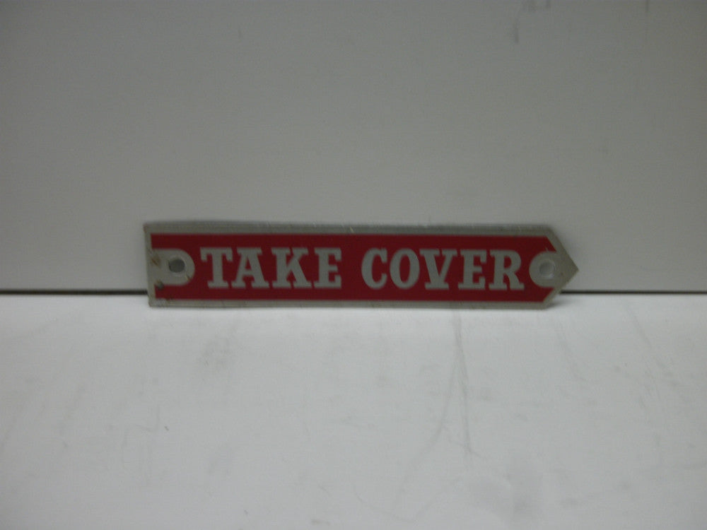 LEGEND PLATE(TAKE COVER) ALUMINUM RED W/SILVER LETTERING &TRIM 3-1/4"LX5/8"W NNB