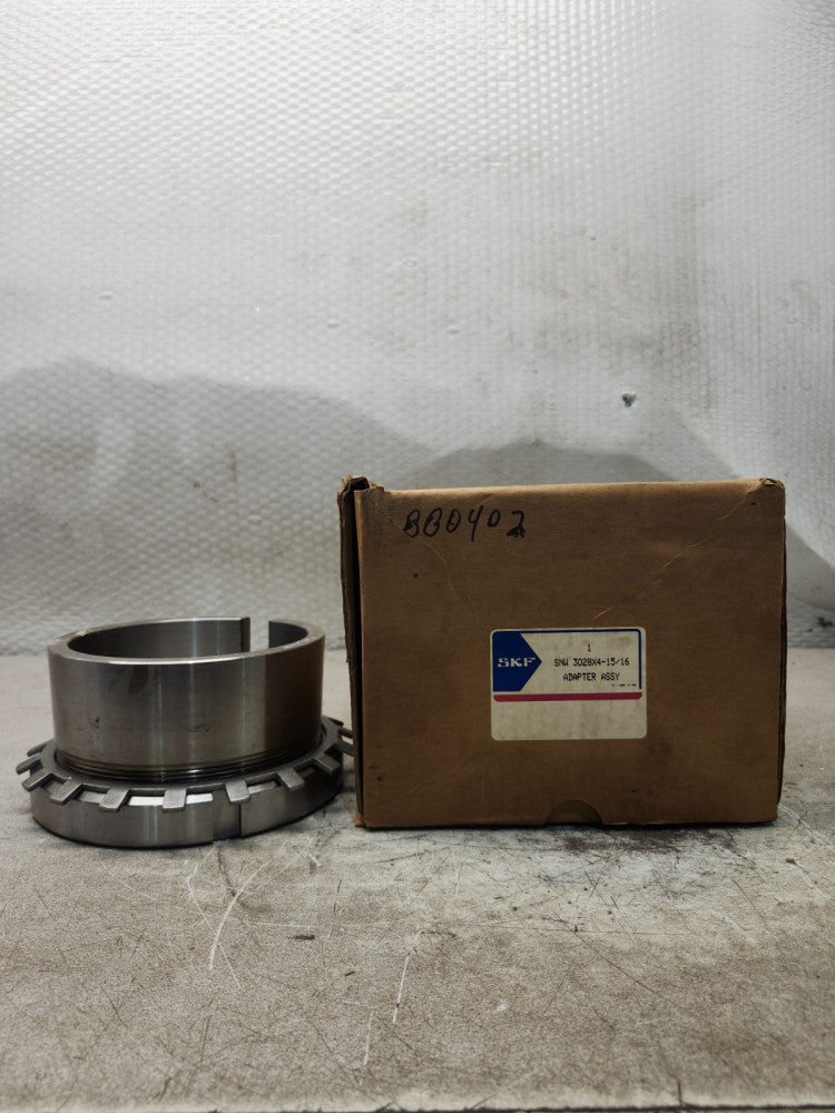 NEW IN BOX SKF ADAPTER ASSY SNW 3028X4-15/16
