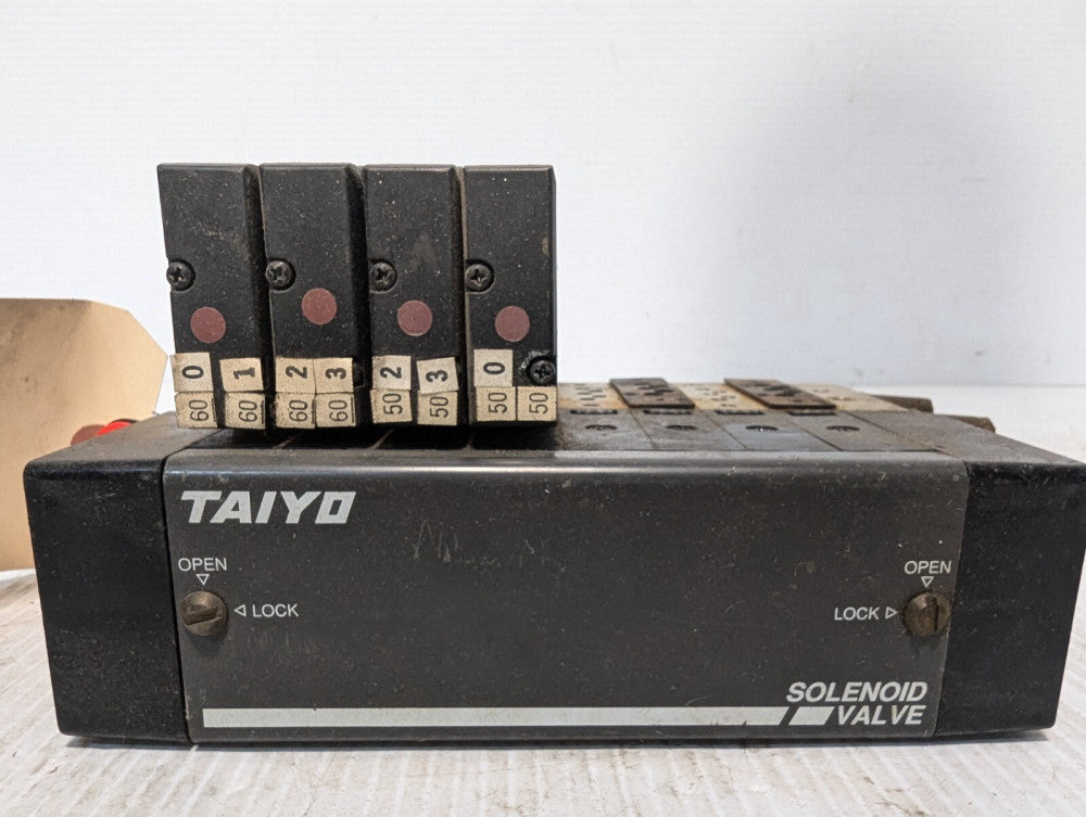 Taiyo Manifold Block with Four Taiyo USR530-SDT8 Solenoid Valves