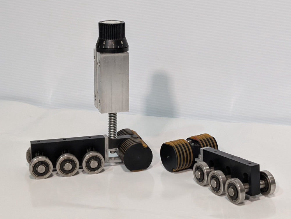 Bell & Howell urethane pressure roller carriages, V-groove wheels, lot of 2