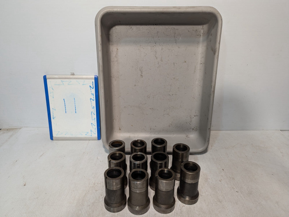 Lot of 11 Sleeve Bushings with Slot, 4" Length, 2.5" OD (widest)