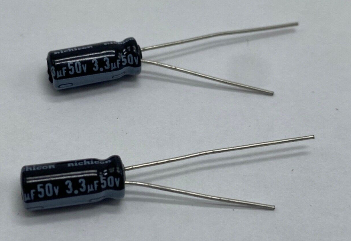 Pack of 2, Nichicon UVZ1H3R3MDD electrolytic capacitor radial lead 3.3uf/50V