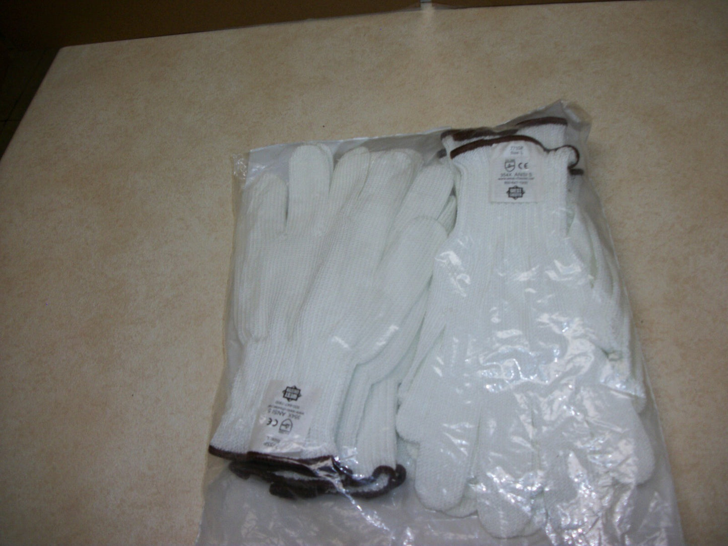 LOT OF 12 NEW PIP BRAND CUT RESISTANT GLOVES 775SP SIZE L WHITE 354X LARGE