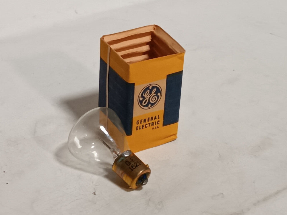Lot of 7 GE 1621 Mini Lamps Lightbulbs, Copper Base, Original Packaging as shown