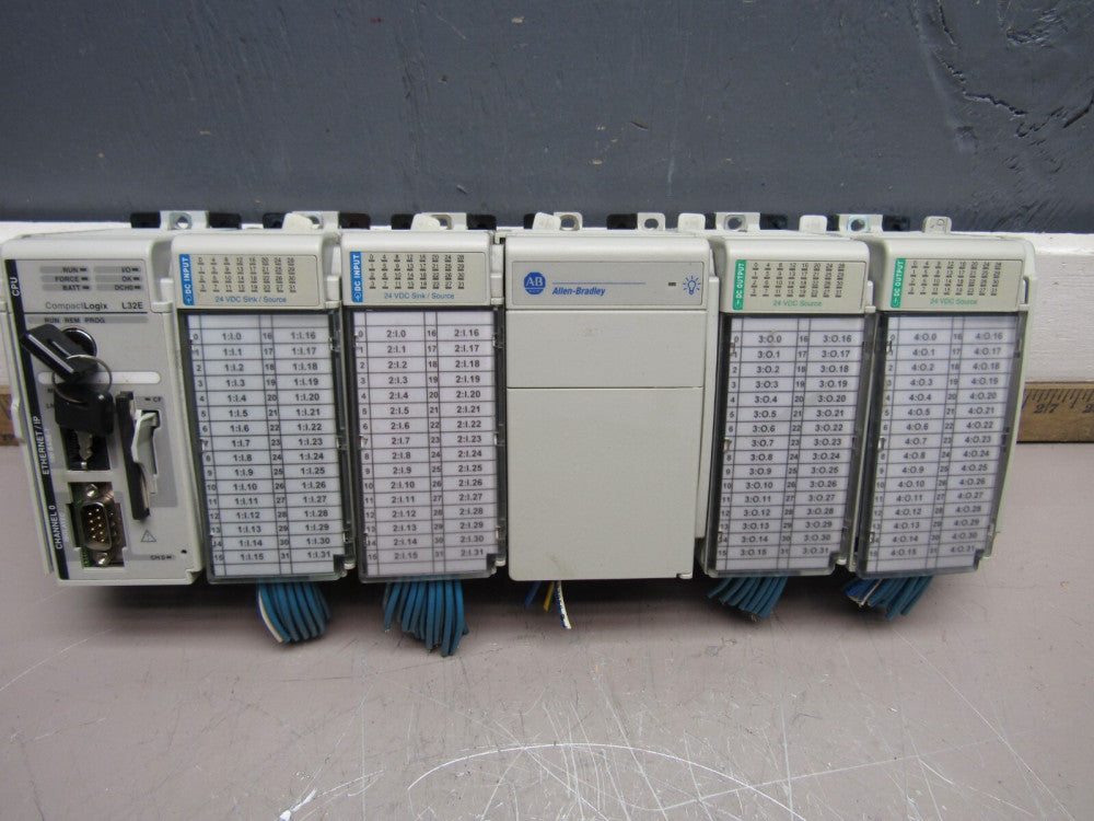 ALLEN BRADLEY COMPACTLOGIX COMPLETE SYSTEM 1769-L32E W/4QTY I/O MODULES XLNT !!