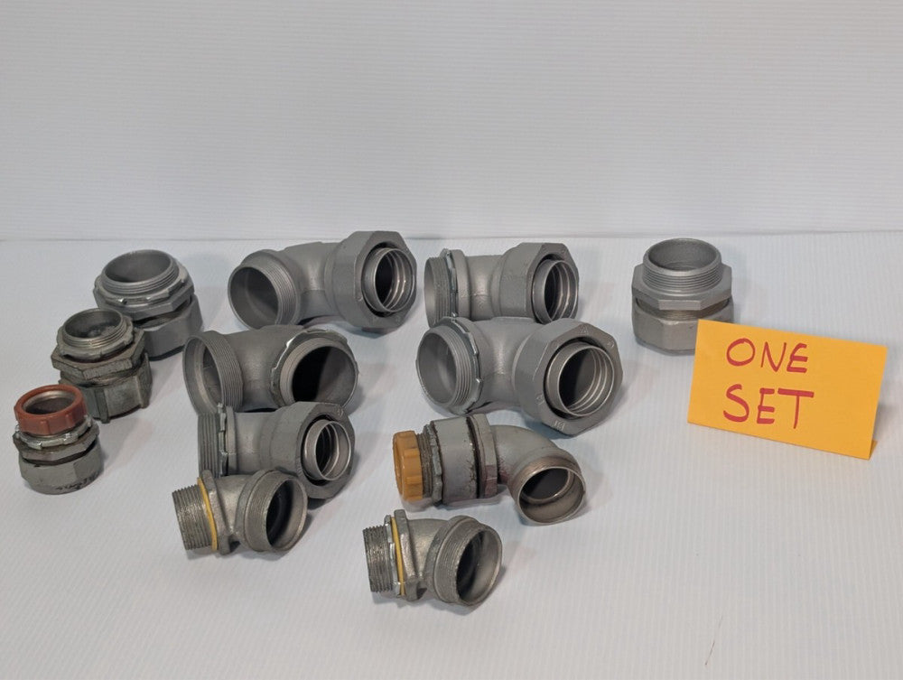 (12) assorted conduit fittings, 45 degree angled, straight, large and small