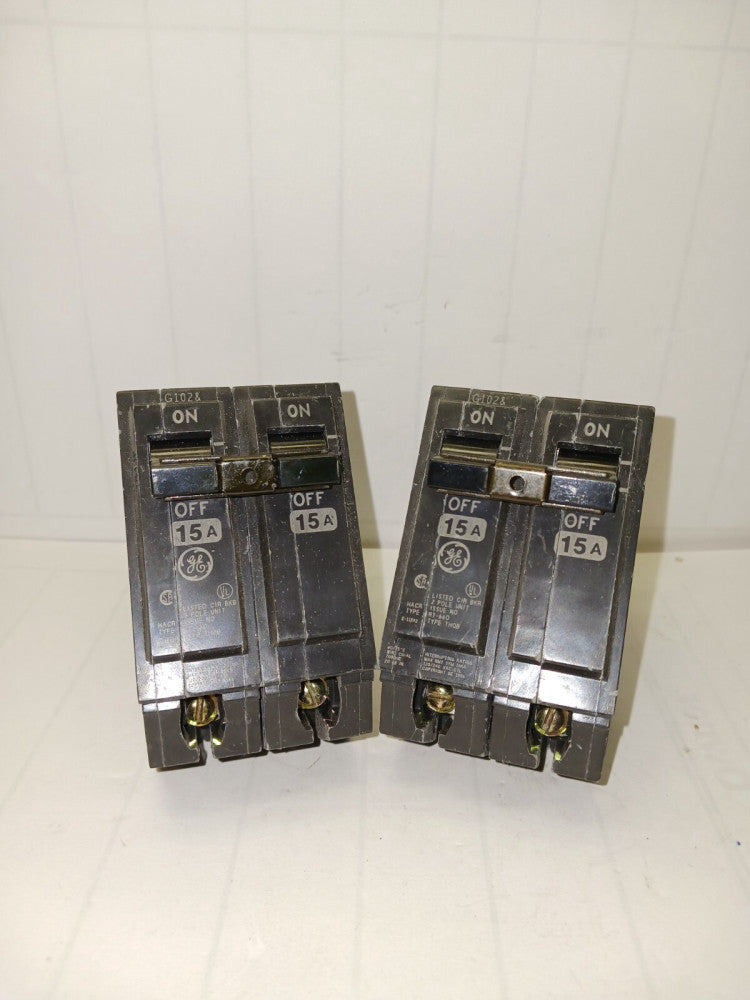 LOT OF 2) GENERAL ELECTRIC 15 AMP CIRCUIT BREAKER 120/240 VAC BOLT ON THQB215