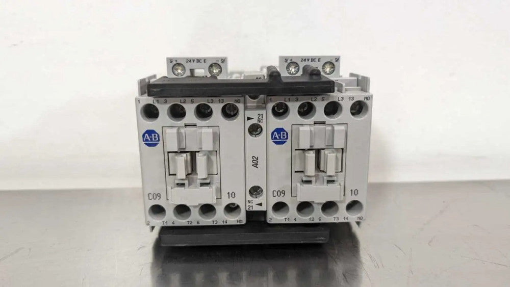Allen-Bradley 104-C09EJ22 Reversing Contactor PN-27725 Ser B 2NO 2NC 24VDC 3 Pol