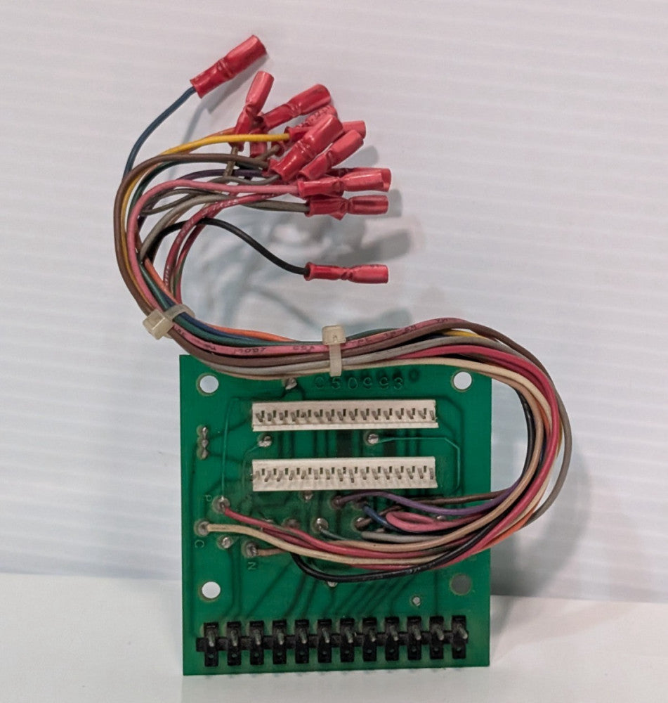 050993 PCB circuit board with multi-colored wire bundle and red spade connectors