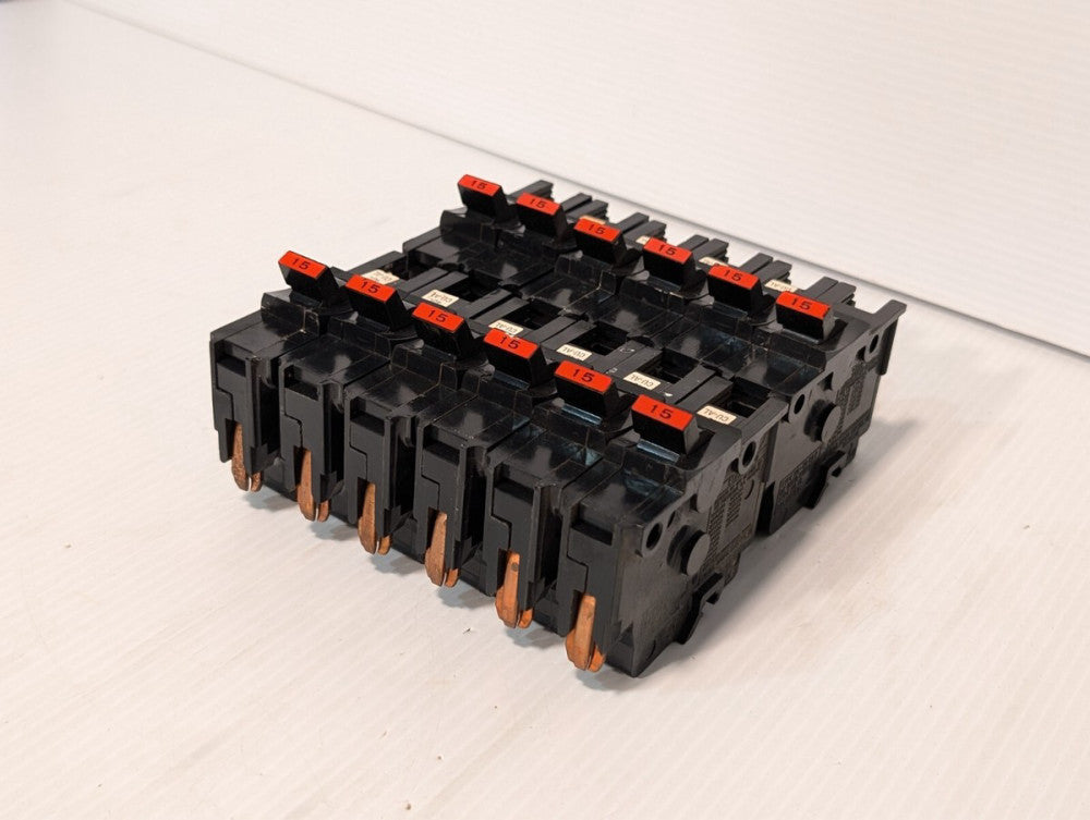 Lot of 6 Federal Pacific NA115 circuit breakers, 15A, 120/240VAC as pictured