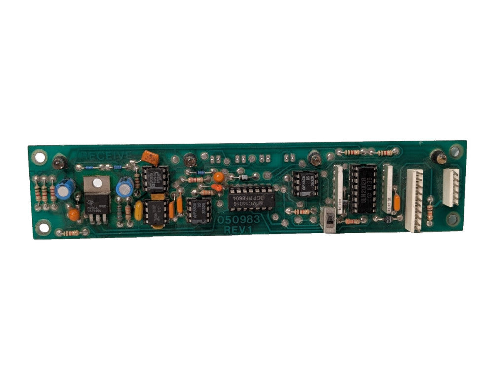050983 Rev. 1 PCB circuit control board labeled "RECEIVE" resistors, diodes