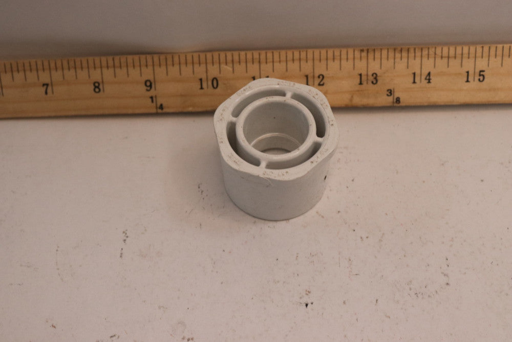 Supply House Bushing PVC Schedule 40 1-1/2" x 3/4" Spigot x Socket 437-210