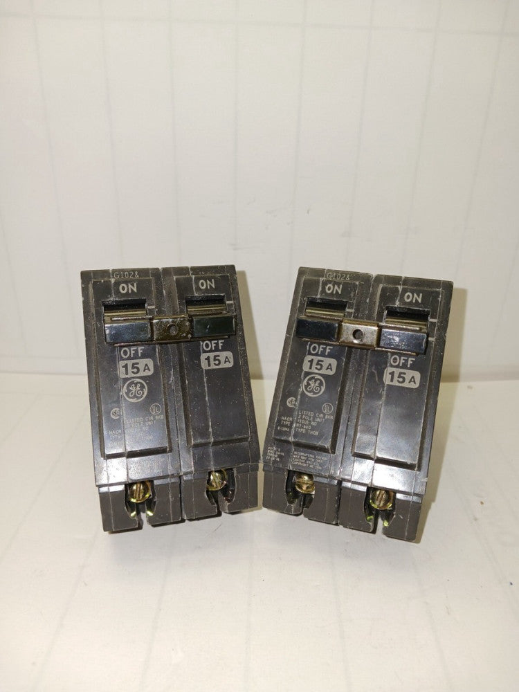 LOT OF 2) GENERAL ELECTRIC 15 AMP CIRCUIT BREAKER 120/240 VAC BOLT ON THQB215