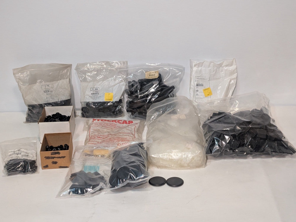 Lot of Approx. 700 Assorted Plastic Caps and Car Plugs, Various Sizes