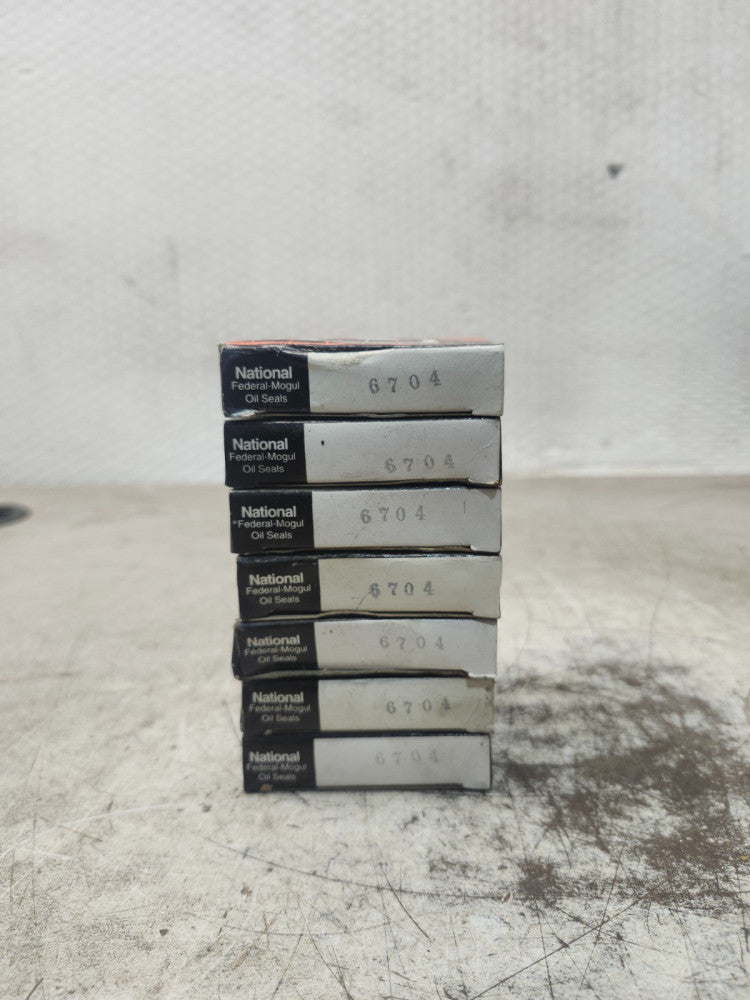 NEW IN BOX LOT OF 7 NATIONAL OIL SEALS 6704