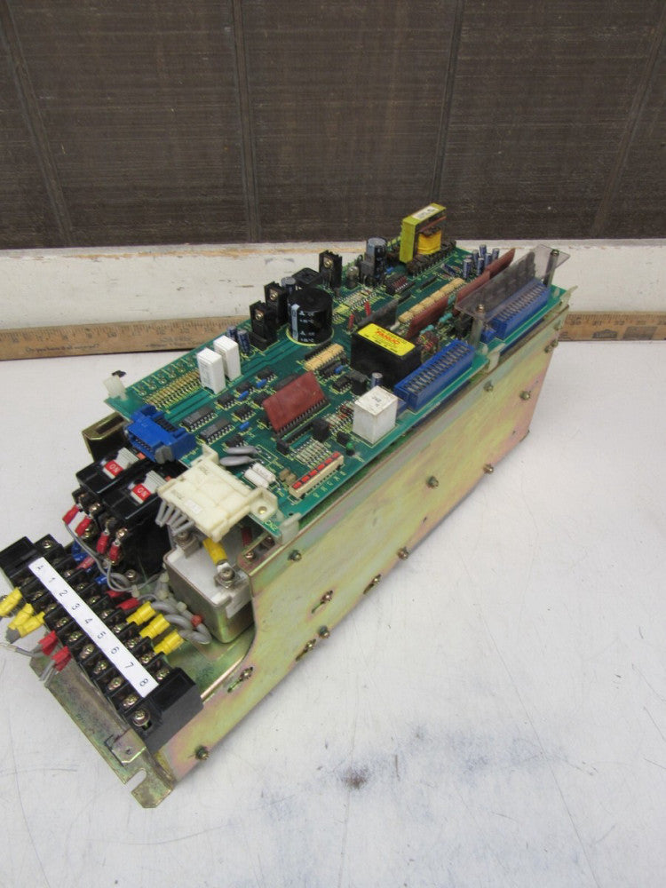 FANUC A06B-6057-H015 SERVO AMPLIFIER WITH A16B-1200-0670/03A TOP BOARD USED M/O