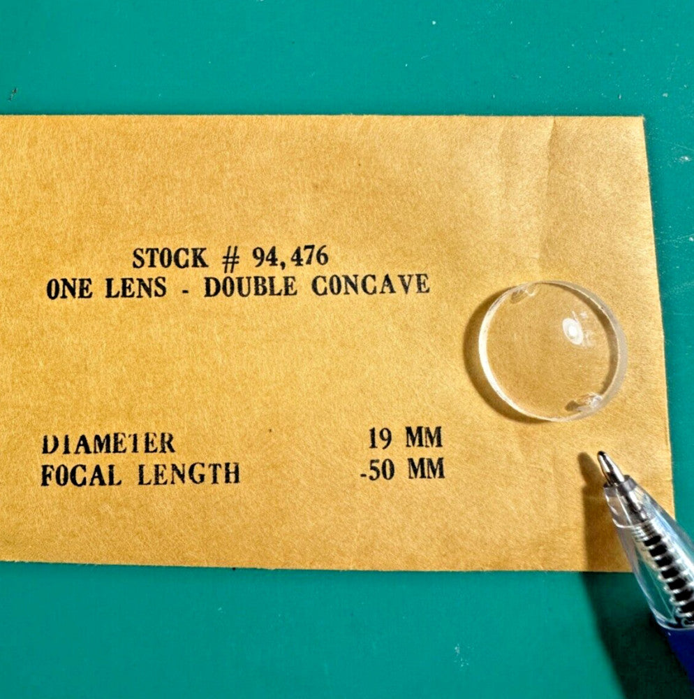 Edmund One Lens Double Concave 19mm Diameter -50mm Focal Length *Chipped*