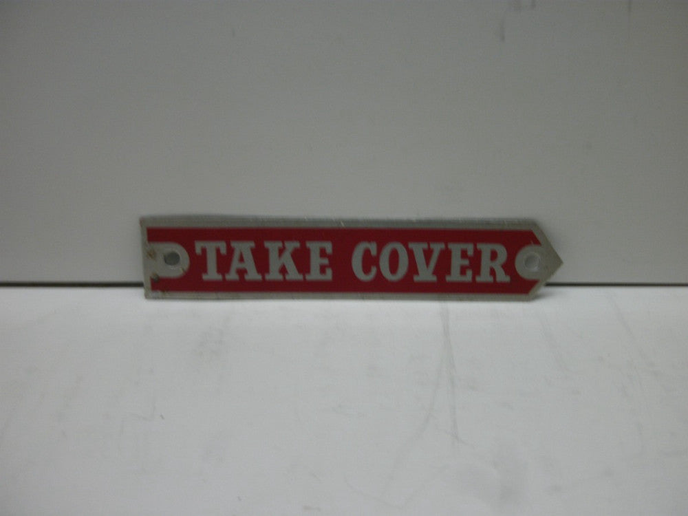 LEGEND PLATE(TAKE COVER) ALUMINUM RED W/SILVER LETTERING &TRIM 3-1/4"LX5/8"W NNB