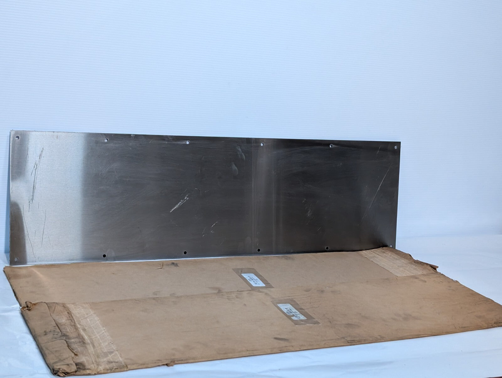 Stainless Steel Door Kick Plate, 10" x 34", 12 Hole as shown in the photos