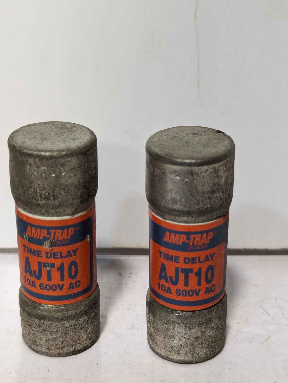 Lot of 2 AJT10 fuses, 3 AJT8 fuses, 8 and 10A, resp., 600VAC, time delay