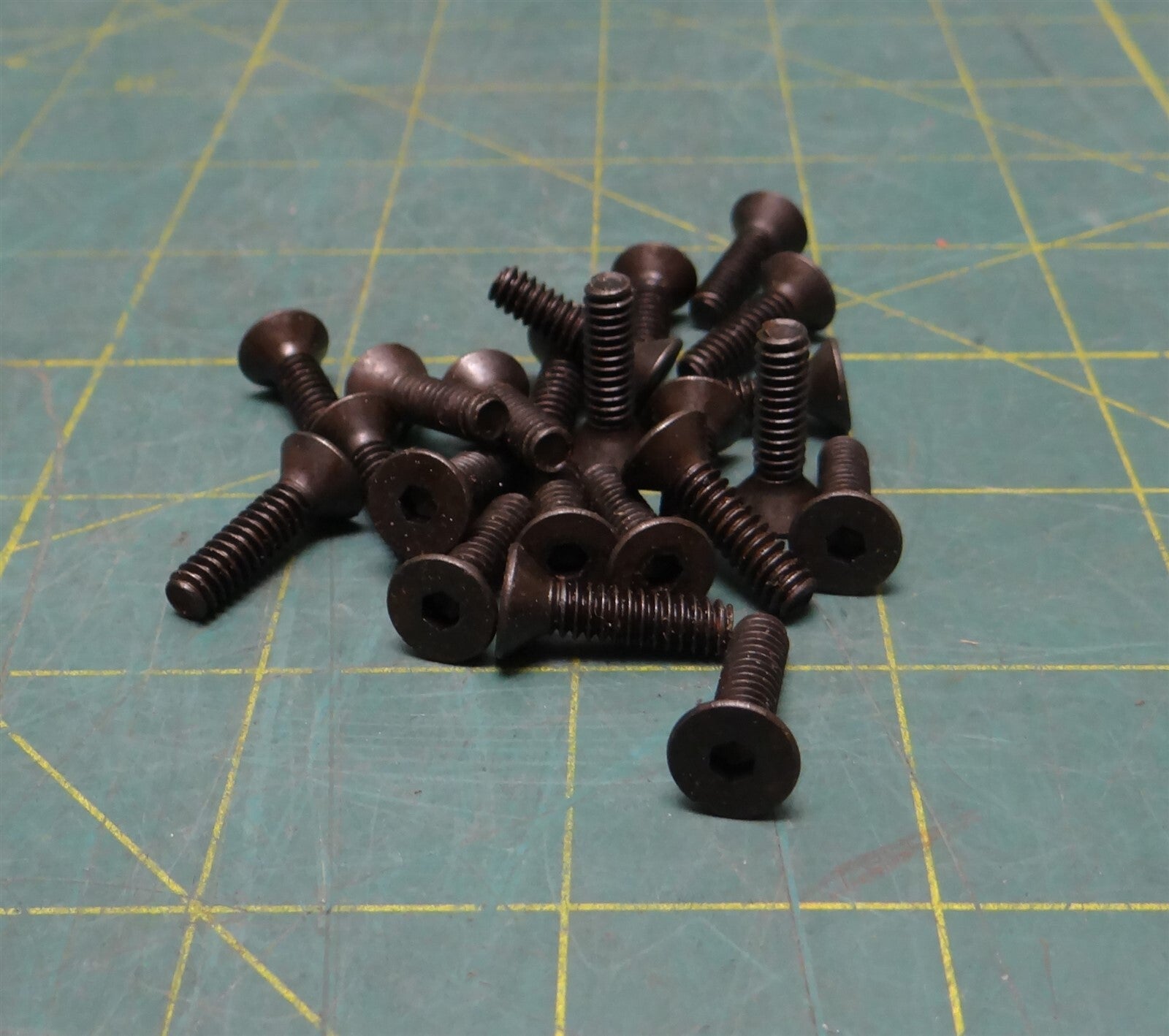 (QTY 22) 10-24 x 11/16" Long Black Oxide Coated Steel Hex Drive Flat Head Screws