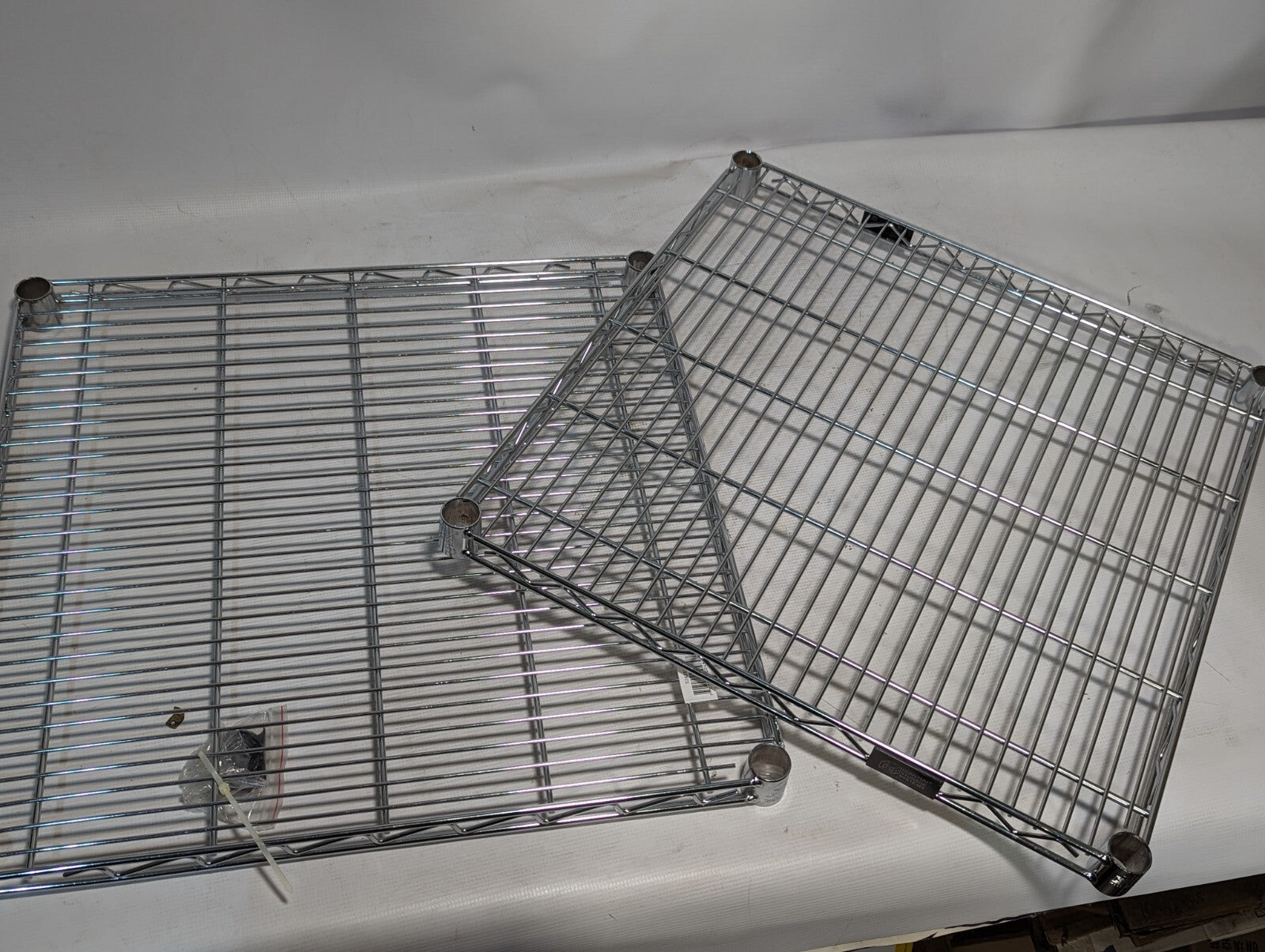 Lot of 2 Nexel S2424C chrome 24 inch x 24 inch shelf racks