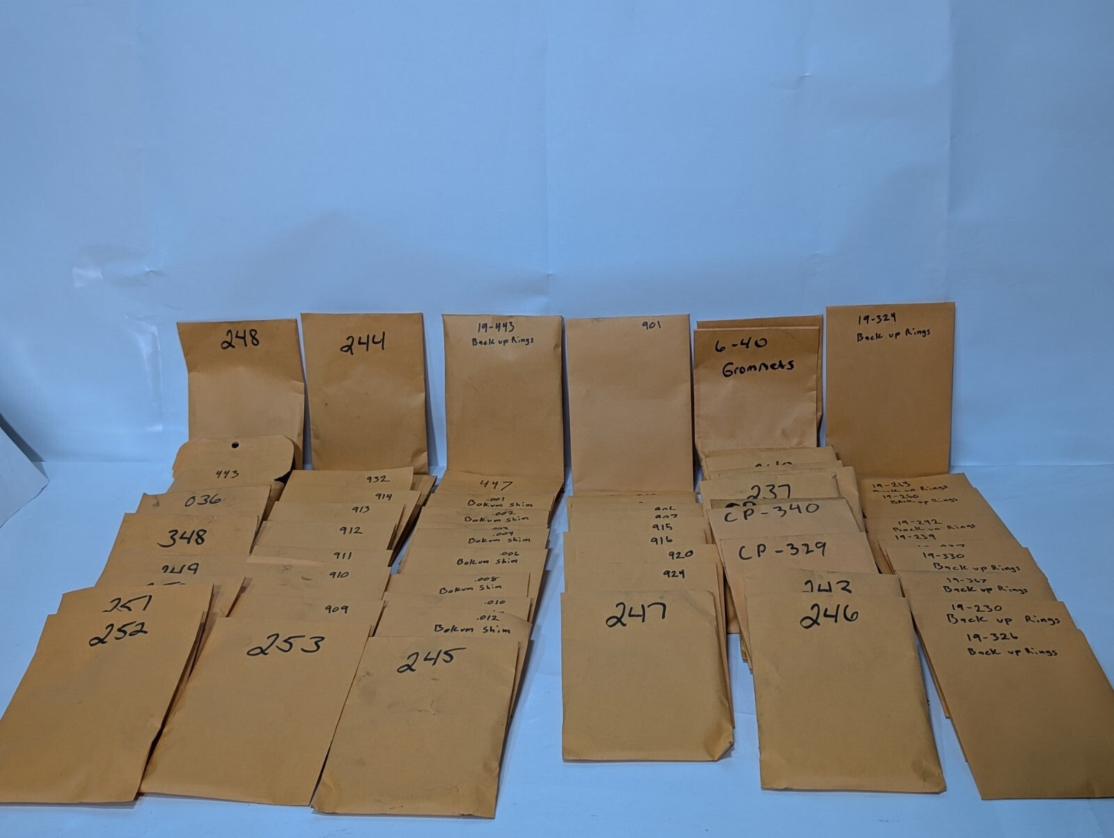 Large lot of assorted O-rings, grommets, shims, and SKF 19- Back-Up rings