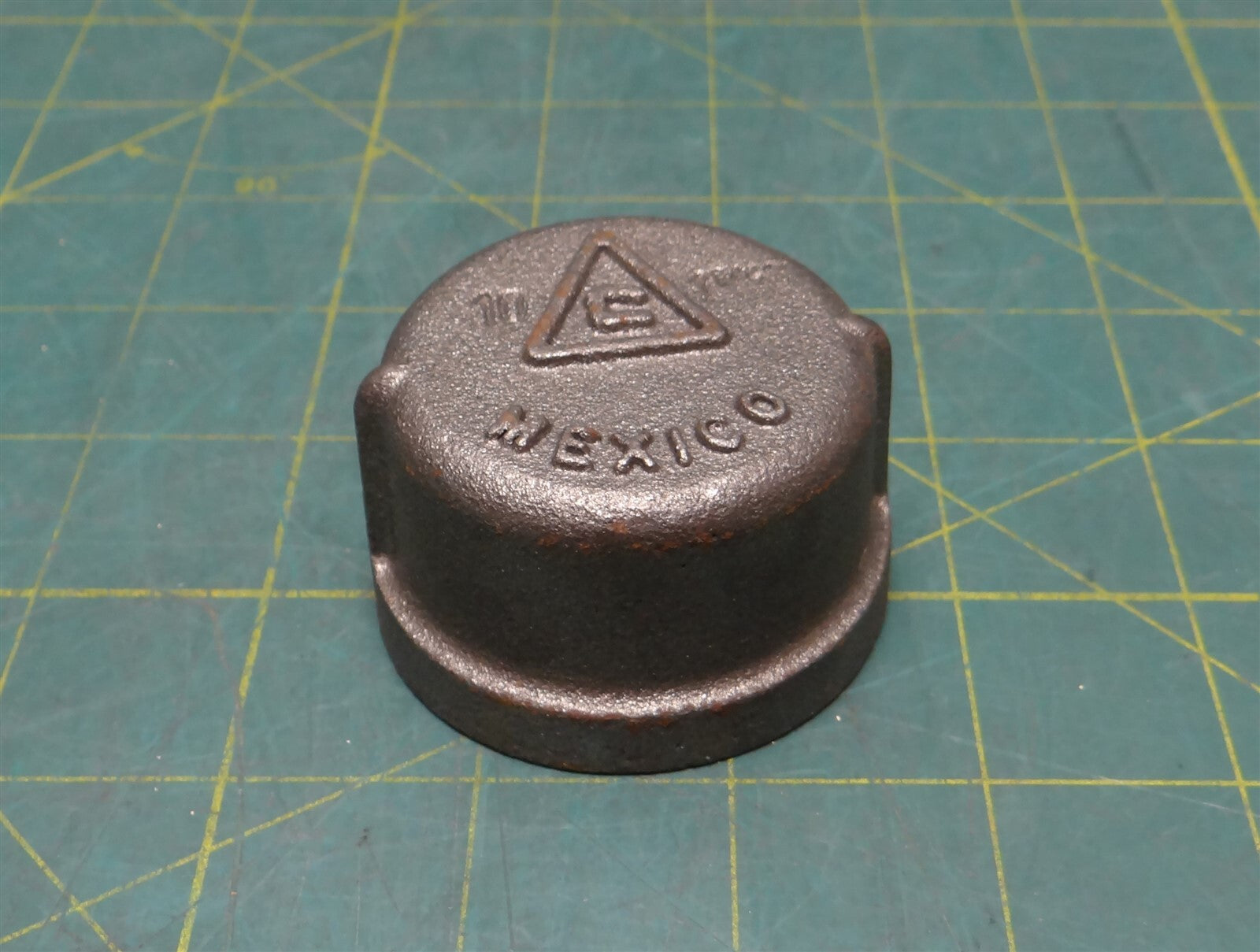 1-1/4" NPT Black Malleable Iron Pipe Cap, 1-3/8" Height, 2-1/4" Outer Diameter